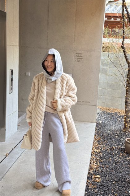 Tevez fur coat